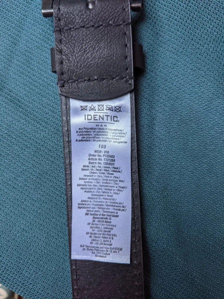 Belt with washing instructions tag